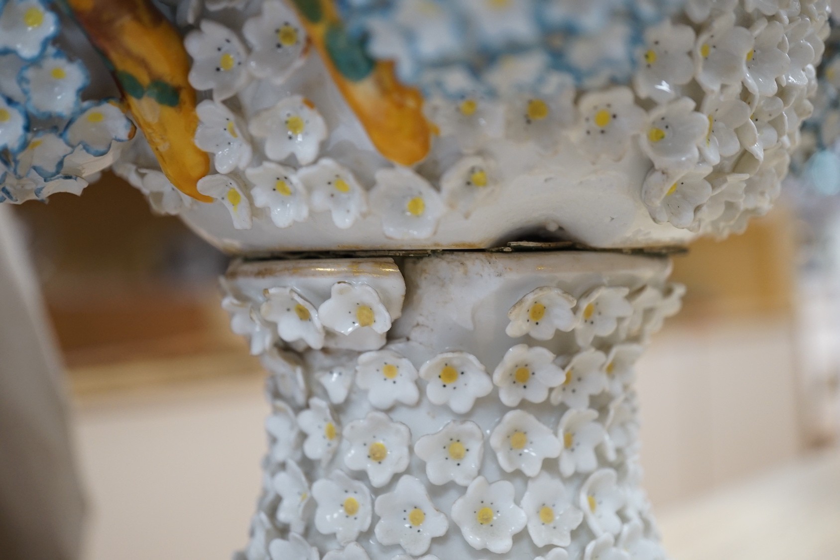 A large 19th century Jacob Petit floral encrusted two handled vase and cover, decorated with birds and flowers, 64cms high